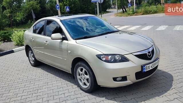 Жовтий Мазда 3, об'ємом двигуна 1.6 л та пробігом 218 тис. км за 5299 $, фото 7 на Automoto.ua