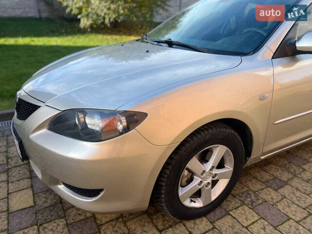 Мазда 3 2007 в Жовкве на Automoto.ua Желтый Мазда 3, объемом двигателя 1.6 л и пробегом 352 тыс. км за 3450 $, фото 16 на Automoto.ua
