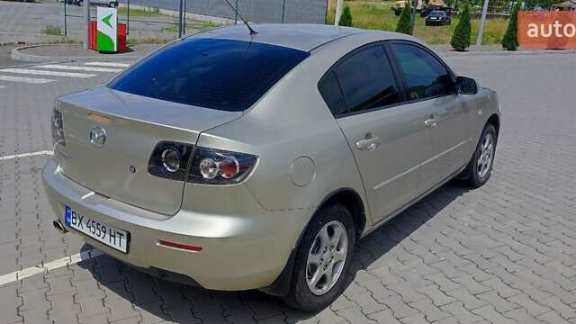 Жовтий Мазда 3, об'ємом двигуна 1.6 л та пробігом 218 тис. км за 5299 $, фото 12 на Automoto.ua