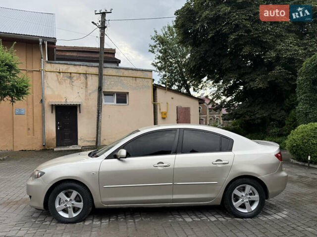 Желтый Мазда 3, объемом двигателя 1.6 л и пробегом 352 тыс. км за 4300 $, фото 10 на Automoto.ua