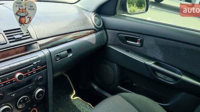 Жовтий Мазда 3, об'ємом двигуна 1.6 л та пробігом 218 тис. км за 5299 $, фото 28 на Automoto.ua