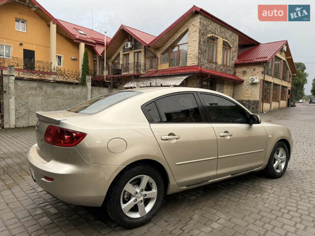 Желтый Мазда 3, объемом двигателя 1.6 л и пробегом 352 тыс. км за 4300 $, фото 19 на Automoto.ua