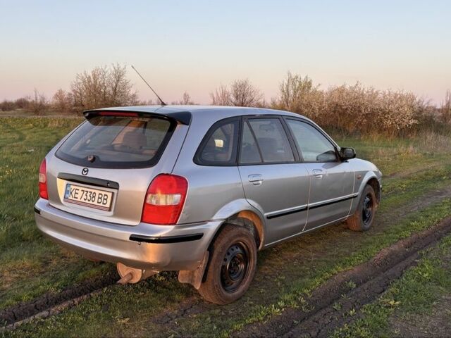 Серый Мазда 3, объемом двигателя 2 л и пробегом 250 тыс. км за 600 $, фото 3 на Automoto.ua