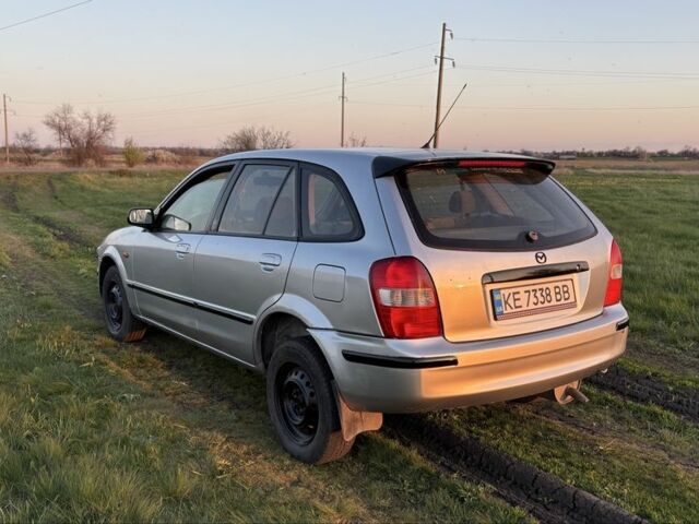 Серый Мазда 3, объемом двигателя 2 л и пробегом 250 тыс. км за 600 $, фото 4 на Automoto.ua