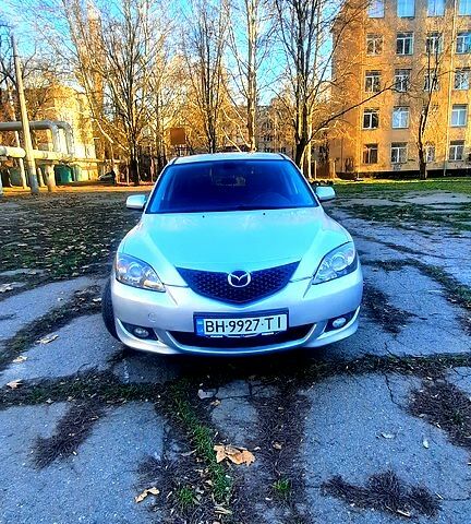 Серый Мазда 3, объемом двигателя 2 л и пробегом 230 тыс. км за 4700 $, фото 1 на Automoto.ua