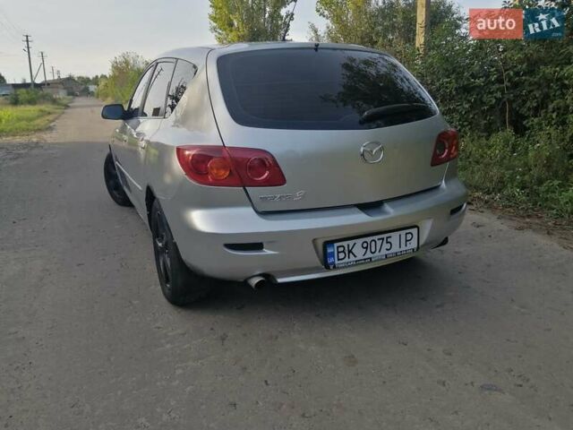 Сірий Мазда 3, об'ємом двигуна 1.6 л та пробігом 283 тис. км за 3650 $, фото 20 на Automoto.ua