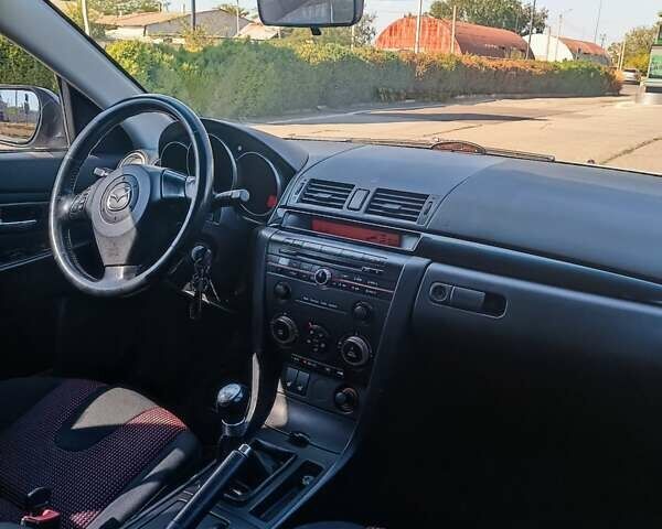 Серый Мазда 3, объемом двигателя 1.6 л и пробегом 158 тыс. км за 5400 $, фото 5 на Automoto.ua