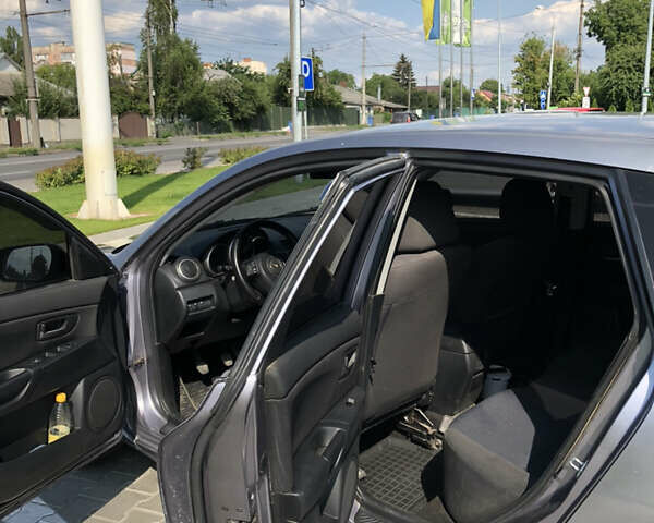 Сірий Мазда 3, об'ємом двигуна 1.6 л та пробігом 230 тис. км за 4500 $, фото 9 на Automoto.ua