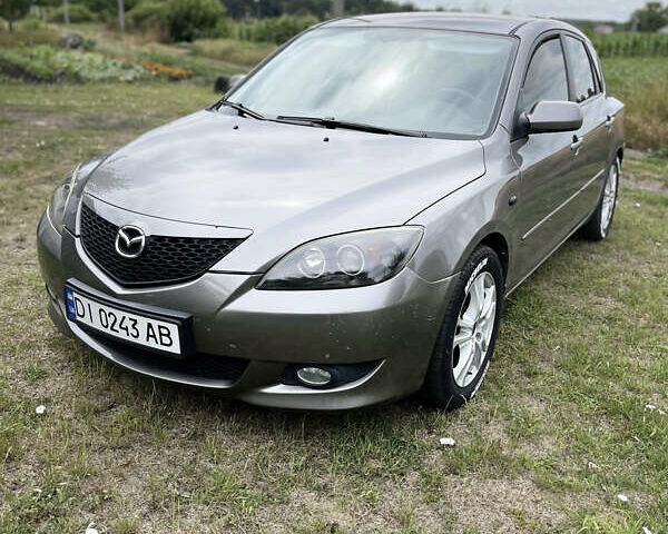 Серый Мазда 3, объемом двигателя 1.6 л и пробегом 260 тыс. км за 3800 $, фото 2 на Automoto.ua
