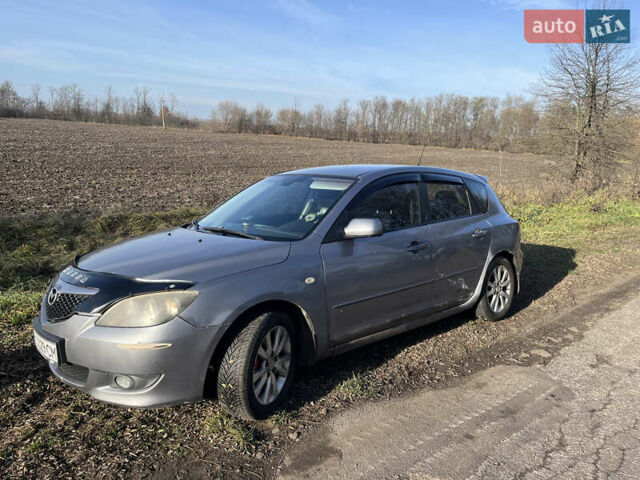 Серый Мазда 3, объемом двигателя 1.6 л и пробегом 467 тыс. км за 3400 $, фото 2 на Automoto.ua