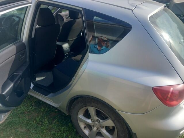 Серый Мазда 3, объемом двигателя 1.6 л и пробегом 29 тыс. км за 3200 $, фото 2 на Automoto.ua