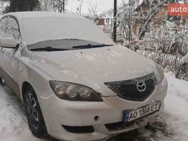 Сірий Мазда 3, об'ємом двигуна 1.35 л та пробігом 250 тис. км за 2450 $, фото 1 на Automoto.ua
