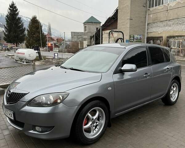 Сірий Мазда 3, об'ємом двигуна 1.6 л та пробігом 275 тис. км за 4700 $, фото 2 на Automoto.ua