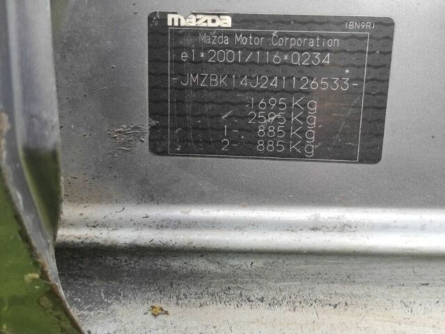 Сірий Мазда 3, об'ємом двигуна 1.4 л та пробігом 240 тис. км за 3999 $, фото 6 на Automoto.ua