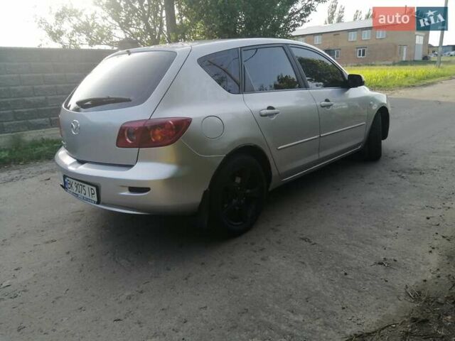 Сірий Мазда 3, об'ємом двигуна 1.6 л та пробігом 283 тис. км за 3650 $, фото 23 на Automoto.ua
