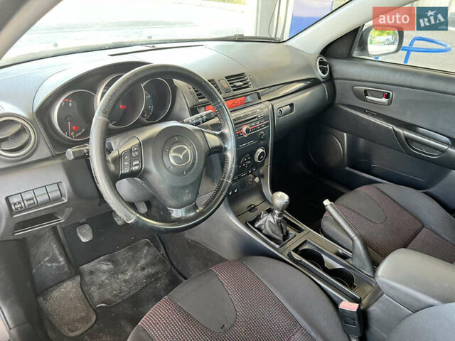 Серый Мазда 3, объемом двигателя 1.6 л и пробегом 237 тыс. км за 3850 $, фото 4 на Automoto.ua