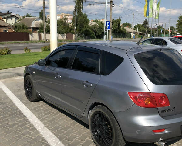 Сірий Мазда 3, об'ємом двигуна 1.6 л та пробігом 230 тис. км за 4500 $, фото 3 на Automoto.ua