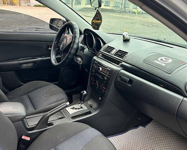 Серый Мазда 3, объемом двигателя 1.6 л и пробегом 282 тыс. км за 4100 $, фото 4 на Automoto.ua