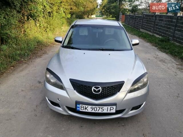Сірий Мазда 3, об'ємом двигуна 1.6 л та пробігом 283 тис. км за 3650 $, фото 26 на Automoto.ua