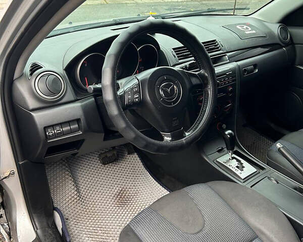 Серый Мазда 3, объемом двигателя 1.6 л и пробегом 282 тыс. км за 4100 $, фото 5 на Automoto.ua