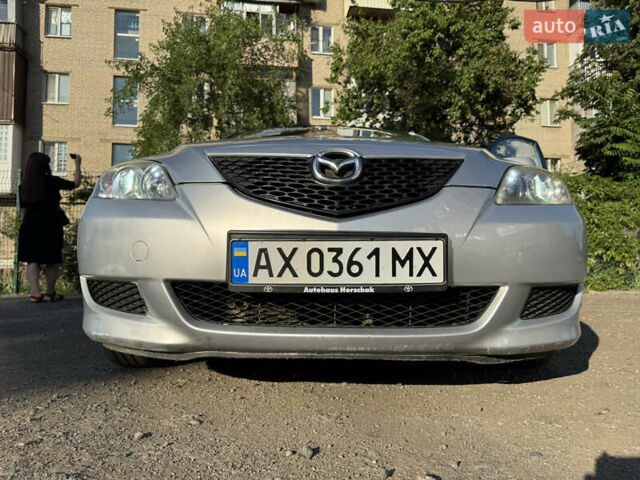 Серый Мазда 3, объемом двигателя 1.6 л и пробегом 186 тыс. км за 4500 $, фото 11 на Automoto.ua