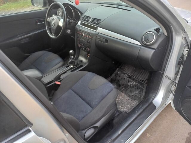 Серый Мазда 3, объемом двигателя 1.6 л и пробегом 255 тыс. км за 3200 $, фото 6 на Automoto.ua