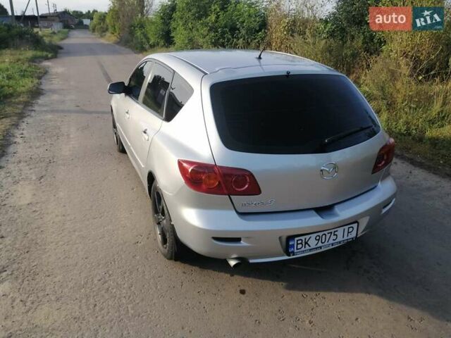 Сірий Мазда 3, об'ємом двигуна 1.6 л та пробігом 283 тис. км за 3650 $, фото 4 на Automoto.ua