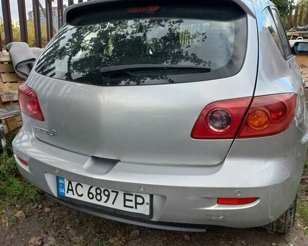 Серый Мазда 3, объемом двигателя 1.6 л и пробегом 250 тыс. км за 2100 $, фото 1 на Automoto.ua