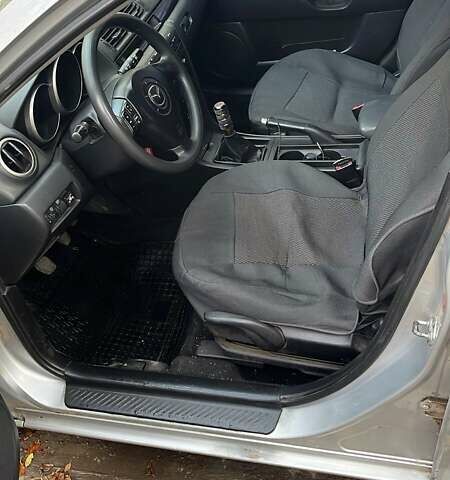 Серый Мазда 3, объемом двигателя 2 л и пробегом 212 тыс. км за 4500 $, фото 3 на Automoto.ua