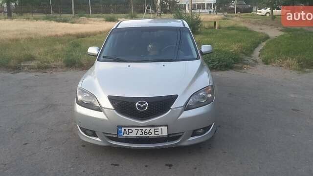 Серый Мазда 3, объемом двигателя 1.6 л и пробегом 327 тыс. км за 4500 $, фото 7 на Automoto.ua