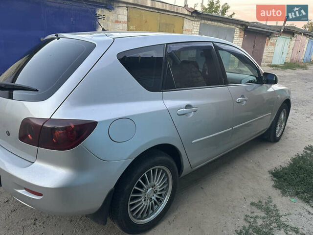 Серый Мазда 3, объемом двигателя 1.6 л и пробегом 261 тыс. км за 4800 $, фото 4 на Automoto.ua