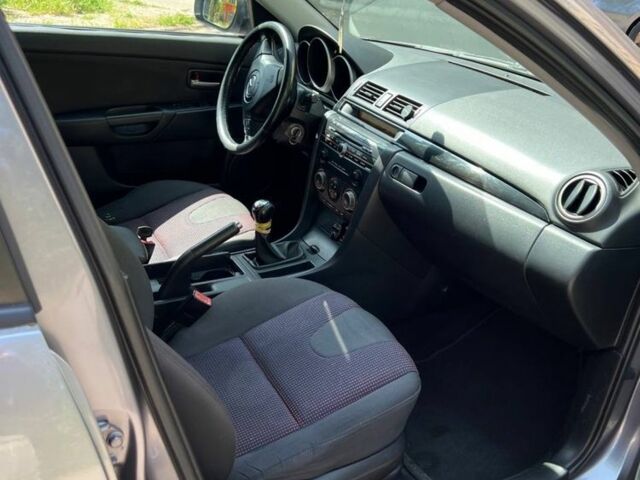 Серый Мазда 3, объемом двигателя 1.6 л и пробегом 200 тыс. км за 3600 $, фото 4 на Automoto.ua