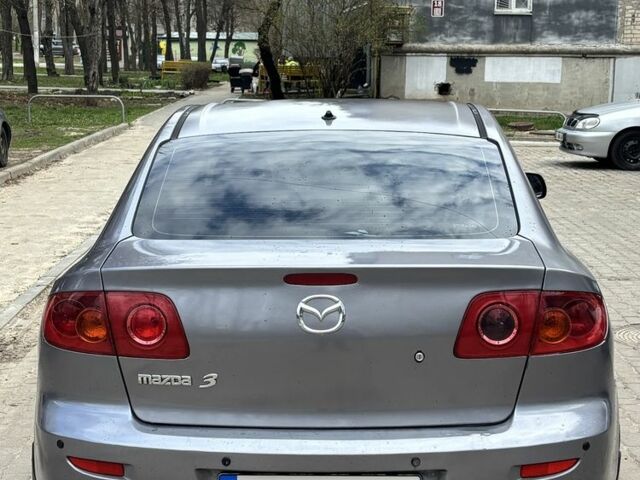 Серый Мазда 3, объемом двигателя 1.6 л и пробегом 246 тыс. км за 2900 $, фото 3 на Automoto.ua