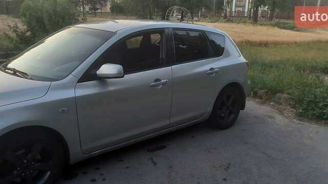 Серый Мазда 3, объемом двигателя 1.6 л и пробегом 327 тыс. км за 4500 $, фото 9 на Automoto.ua