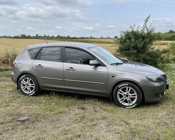 Серый Мазда 3, объемом двигателя 1.6 л и пробегом 260 тыс. км за 3800 $, фото 3 на Automoto.ua