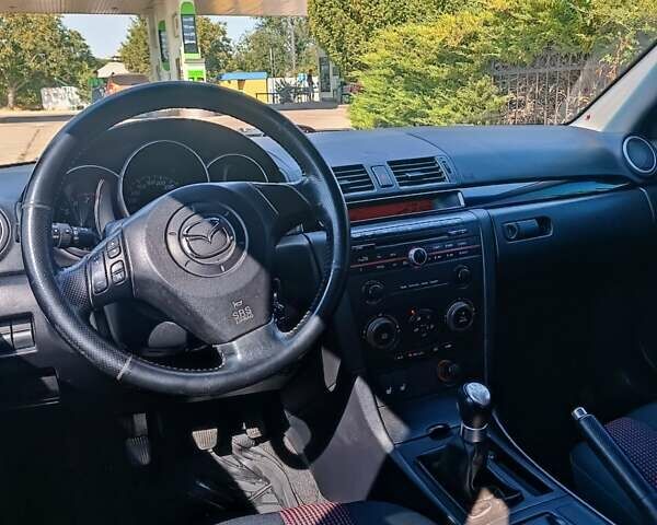 Серый Мазда 3, объемом двигателя 1.6 л и пробегом 158 тыс. км за 5400 $, фото 7 на Automoto.ua