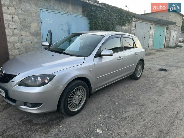 Серый Мазда 3, объемом двигателя 1.6 л и пробегом 261 тыс. км за 4800 $, фото 2 на Automoto.ua