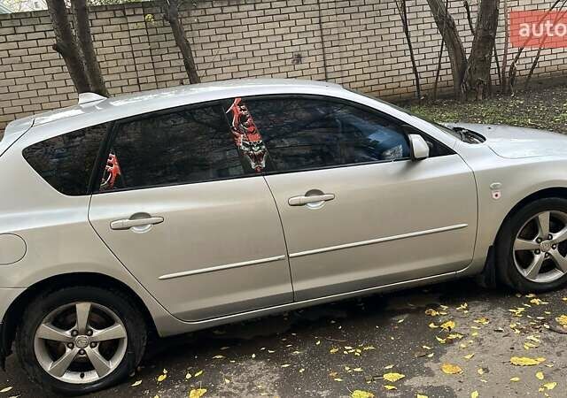 Серый Мазда 3, объемом двигателя 2 л и пробегом 212 тыс. км за 4500 $, фото 2 на Automoto.ua