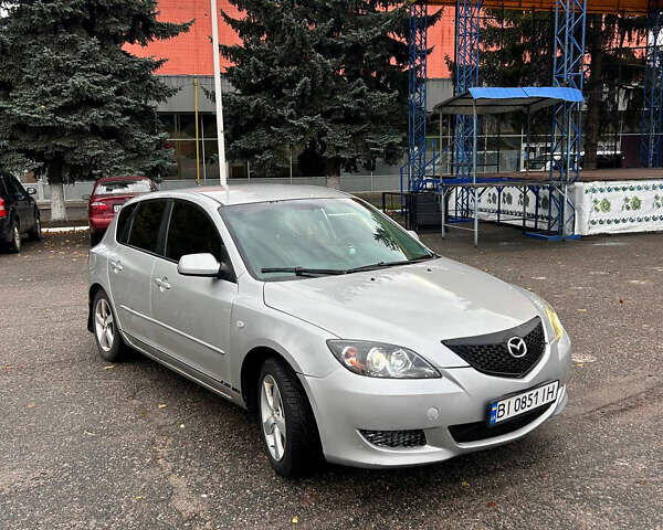 Серый Мазда 3, объемом двигателя 1.6 л и пробегом 282 тыс. км за 4100 $, фото 1 на Automoto.ua