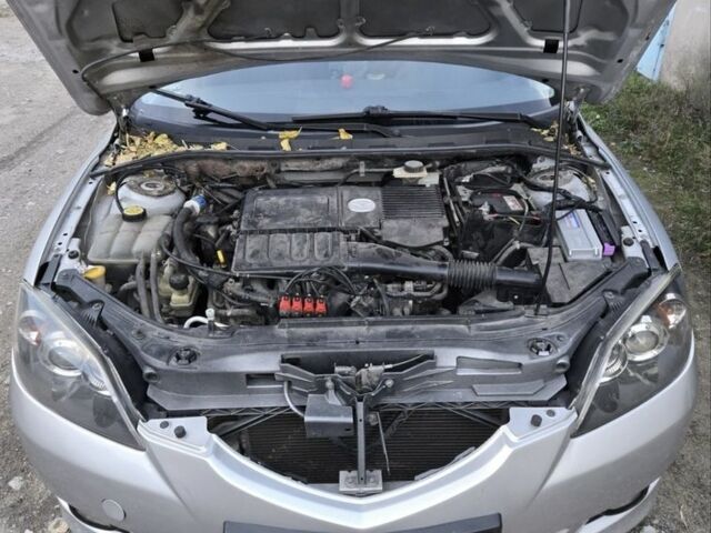 Сірий Мазда 3, об'ємом двигуна 1.6 л та пробігом 295 тис. км за 4550 $, фото 19 на Automoto.ua