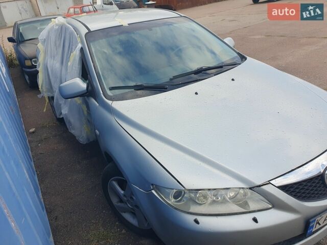 Серый Мазда 3, объемом двигателя 2 л и пробегом 250 тыс. км за 1500 $, фото 1 на Automoto.ua