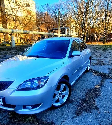 Серый Мазда 3, объемом двигателя 2 л и пробегом 230 тыс. км за 4700 $, фото 4 на Automoto.ua