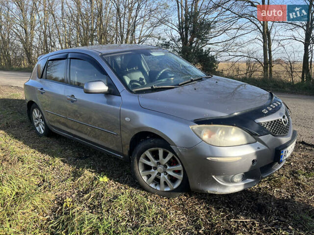 Серый Мазда 3, объемом двигателя 1.6 л и пробегом 467 тыс. км за 3400 $, фото 1 на Automoto.ua