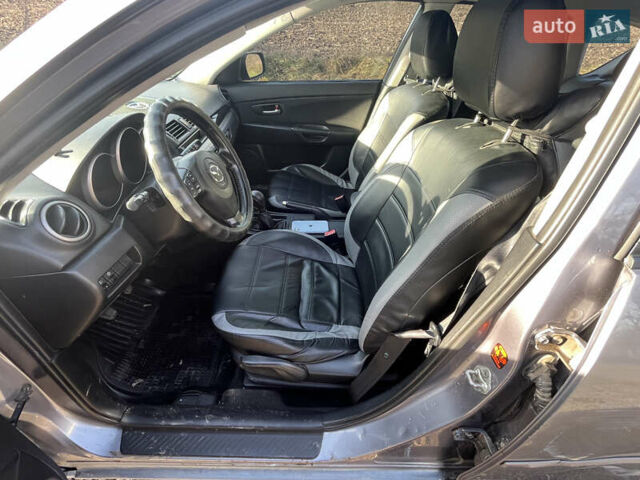 Серый Мазда 3, объемом двигателя 1.6 л и пробегом 467 тыс. км за 3400 $, фото 5 на Automoto.ua