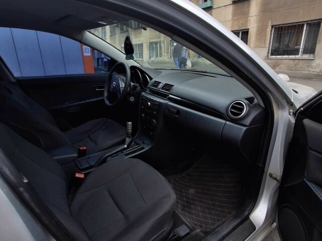 Сірий Мазда 3, об'ємом двигуна 2 л та пробігом 221 тис. км за 3491 $, фото 1 на Automoto.ua