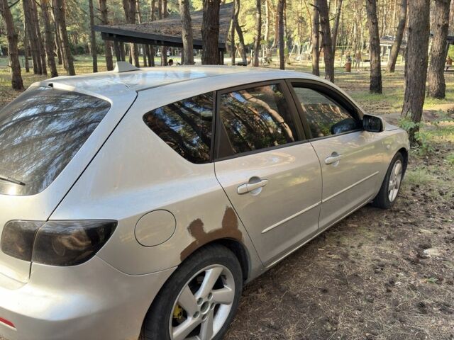 Сірий Мазда 3, об'ємом двигуна 1.6 л та пробігом 307 тис. км за 3495 $, фото 3 на Automoto.ua