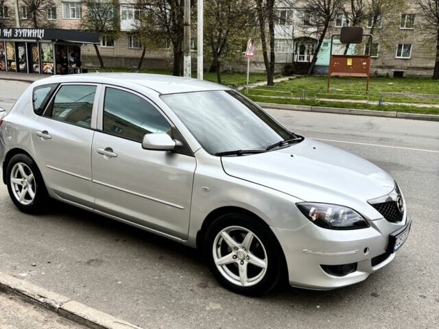 Сірий Мазда 3, об'ємом двигуна 2 л та пробігом 300 тис. км за 4680 $, фото 2 на Automoto.ua