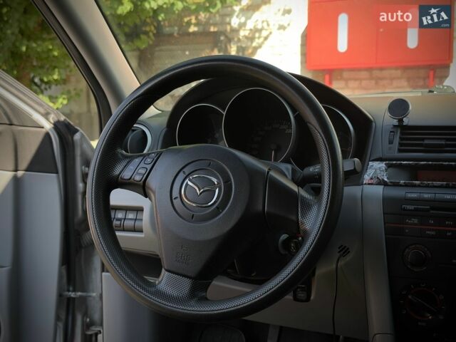 Сірий Мазда 3, об'ємом двигуна 1.6 л та пробігом 210 тис. км за 5200 $, фото 9 на Automoto.ua