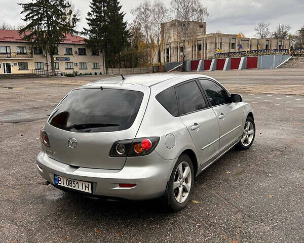 Серый Мазда 3, объемом двигателя 1.6 л и пробегом 282 тыс. км за 4100 $, фото 2 на Automoto.ua