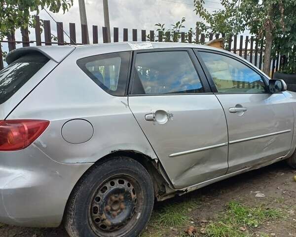 Серый Мазда 3, объемом двигателя 1.6 л и пробегом 250 тыс. км за 2100 $, фото 2 на Automoto.ua